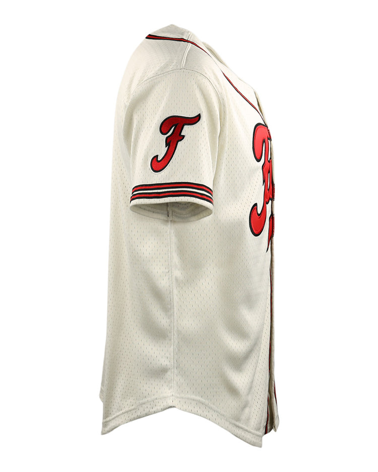Side view of the EFF Fuji Athletic Club DNA Replica Button-Up Mesh Jersey in white with red and black trim, a red F on the sleeve honoring Frank Fukuda, and bold red chest lettering inspired by Japanese baseball style.