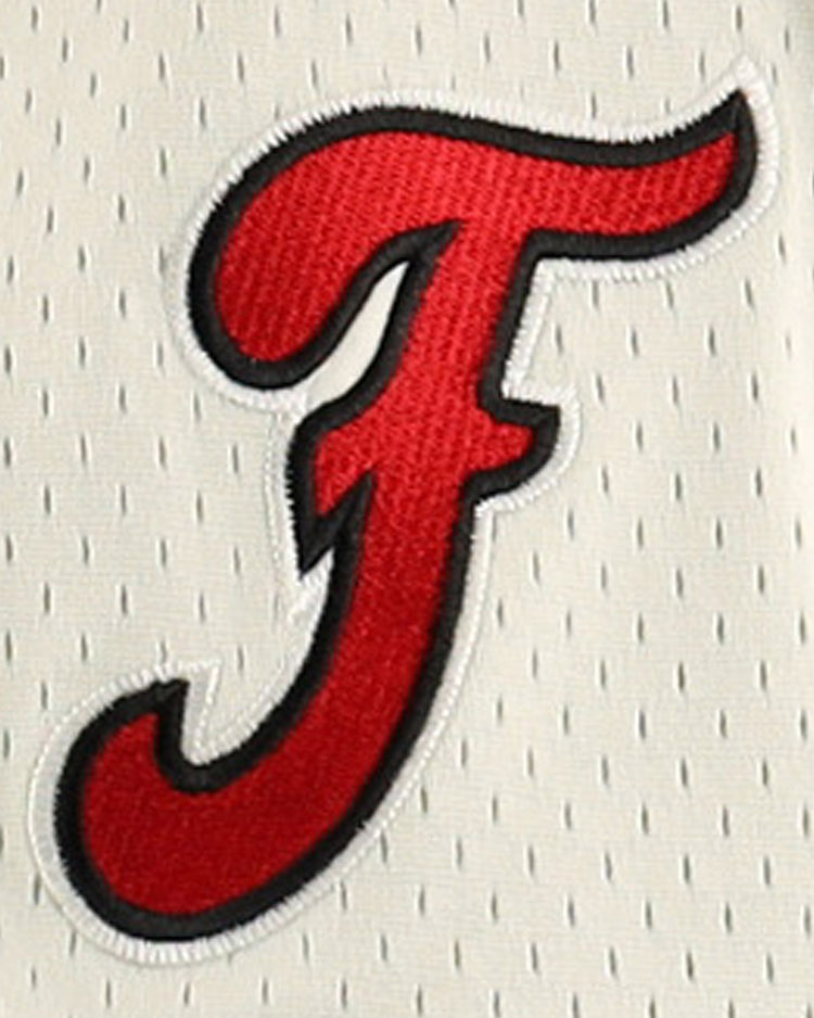 A red, stylized letter F with a black outline is embroidered on white mesh fabric, part of the Fuji Athletic Club EFF DNA Replica Button-Up Mesh Jersey by EFF.