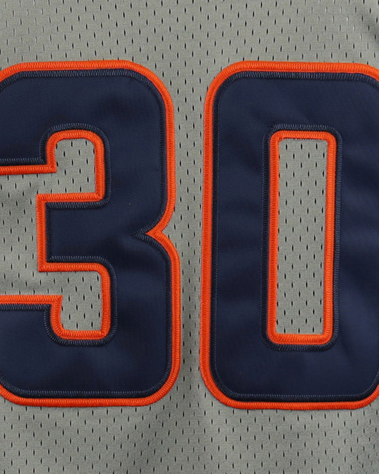 The image features the EFF Hiroshima Carp EFF DNA Replica Button-Up Mesh Jersey in gray, inspired by vintage styles, with large navy 30 digits outlined in orange. The perforated mesh fabric adds breathability.