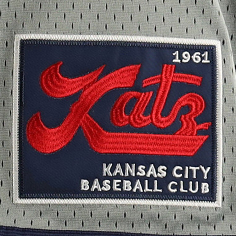 The Kansas City Katz EFF DNA Replica Button-Up Mesh Jersey by EFF features Katz in red script, 1961 in white, and Kansas City Baseball Club in block white on a blue and gray background, honoring the Katz Drugstores baseball legacy.