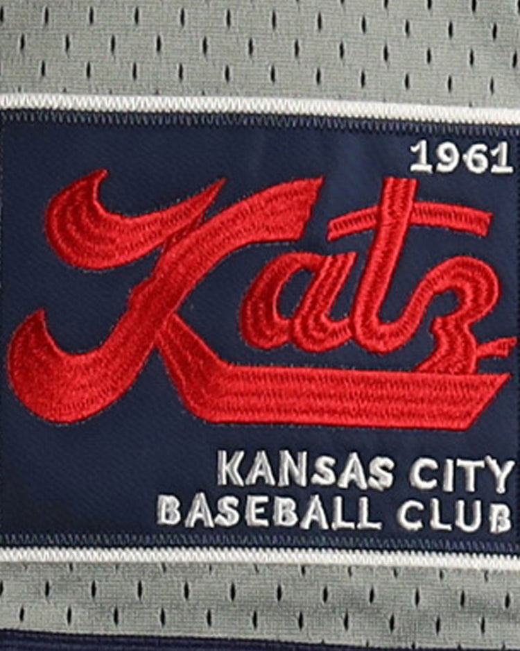 The Kansas City Katz EFF DNA Replica Button-Up Mesh Jersey by EFF features Katz in red script, 1961 in white, and Kansas City Baseball Club in block white on a blue and gray background, honoring the Katz Drugstores baseball legacy.