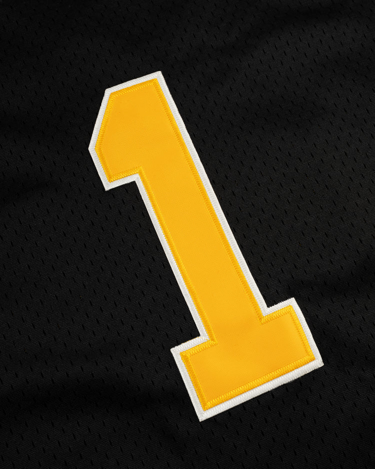 A large yellow number one with a white outline is stitched onto the black Osaka Tigers Mesh Button-Up Baseball Jersey from EFF, echoing the iconic uniforms once worn at Koshien Field.