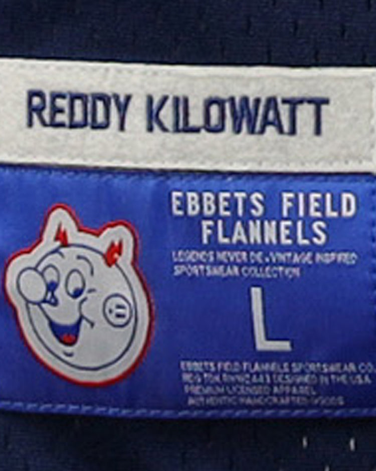 The Reddy Kilowatt EFF DNA Replica Button-Up Mesh Jersey features a white patch with Reddy Kilowatt, a blue patch with EFF and a cartoon face, plus size L and care info below—celebrating electricity’s iconic symbol.