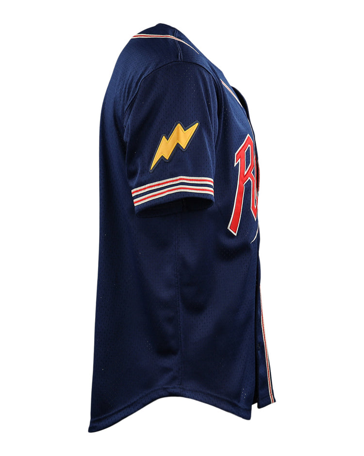 The EFF Reddy Kilowatt EFF DNA Replica Button-Up Mesh Jersey in navy blue is shown from the side, with a yellow lightning bolt patch on the sleeve symbolizing safe electricity and partial red lettering on the front.