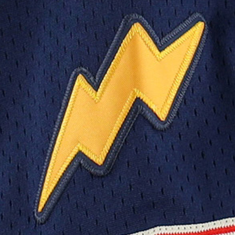 The Reddy Kilowatt EFF DNA Replica Button-Up Mesh Jersey by EFF features a yellow lightning bolt patch, outlined in blue and stitched onto dark blue perforated fabric, evoking the iconic electric power mascot.