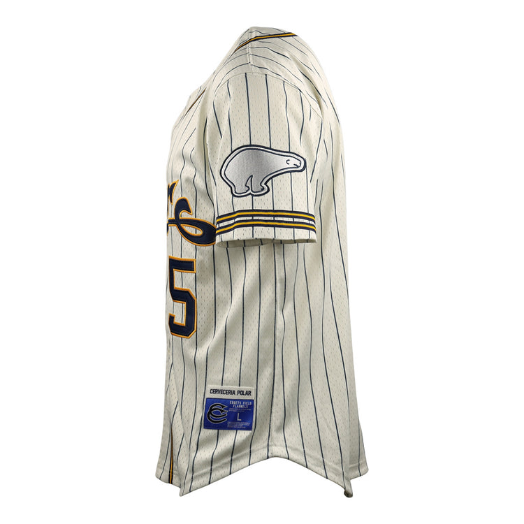 The EFF Cerveceria Polar DNA Replica Button-Up Mesh Jersey is a white, pinstriped baseball shirt with navy and yellow details, the number 25, a bear patch on the sleeve, and classic style shown in side view.