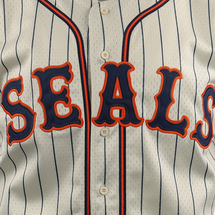 Close-up of the EFF San Francisco Seals DNA Replica Button-Up Mesh Jersey, with bold blue and orange SEALS lettering on white pinstripes—a vintage-inspired design by EFF honoring the classic San Francisco team.
