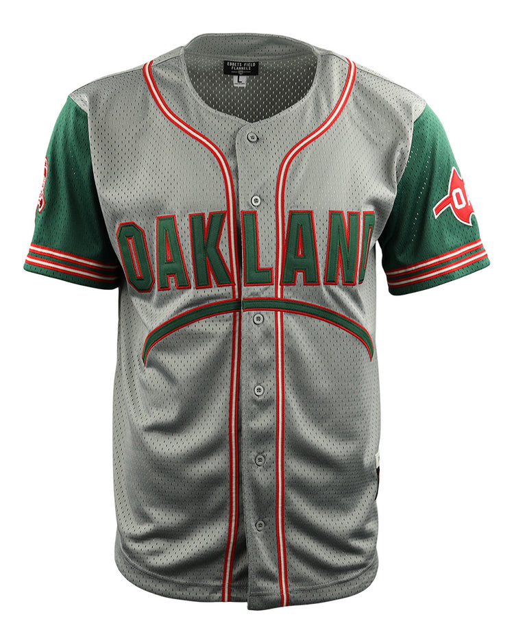 The EFF Oakland Oaks DNA Replica Button-Up Mesh Jersey features a gray body, green sleeves, red and green trim stripes, OAKLAND across the chest, sleeve team patches, and is inspired by classic Pacific Coast League style.