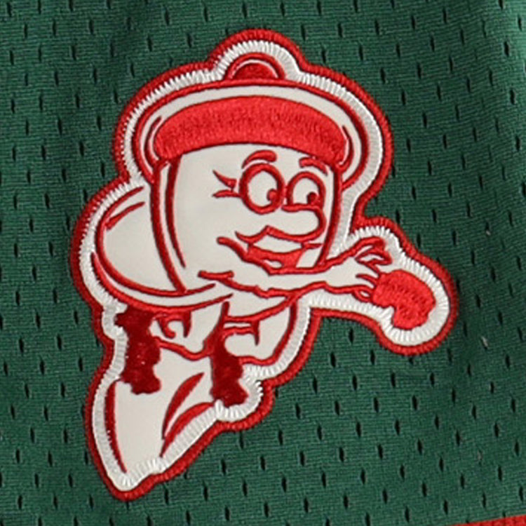 A cartoonish ketchup bottle mascot with arms, legs, and glasses, reaching forward in red on green mesh, decorates the Oakland Oaks EFF DNA Replica Button-Up Mesh Jersey by EFF.