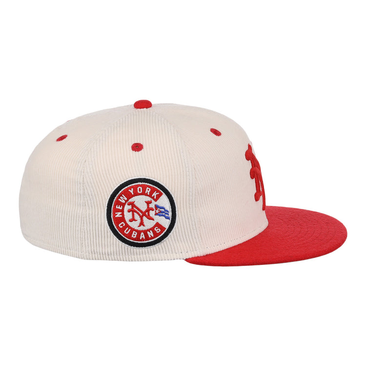 The EFF New York Cubans NLB Ground Rule Double Fitted Ballcap features cream corduroy, a red brim and button, a 3D NY logo, and a side patch reading New York Cubans in blue and red, honoring the Negro National League.