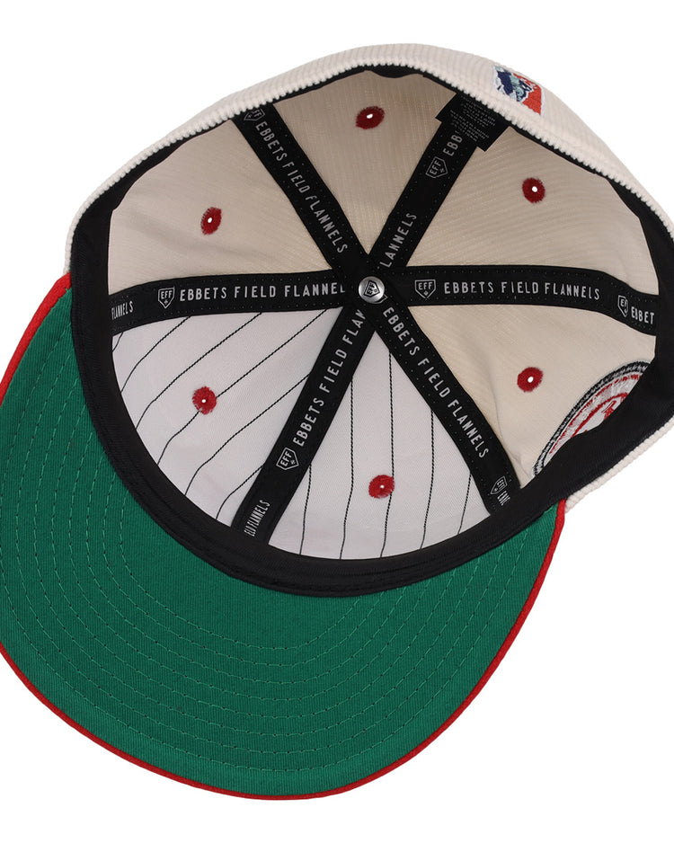 The underside of the EFF New York Cubans NLB Ground Rule Double Fitted Ballcap features a green brim, cream pinstriped interior, red stitched vents, and black EFF taping—honoring the Negro National League’s legacy.