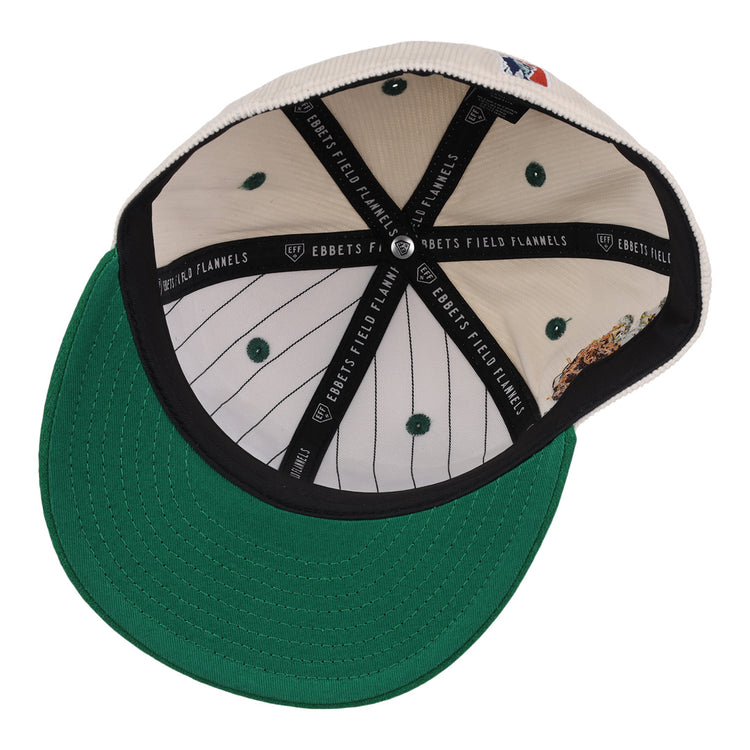 The underside of the Veracruz Azules NLB Ground Rule Double Fitted Ballcap by EFF features a green brim, black sweatband with EBBETS FIELD FLANNELS text, and a white crown with green pinstripes and ventilation holes.