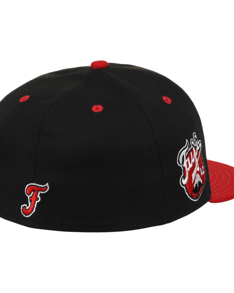 The Fuji Athletic Club EFF DNA Fitted Ballcap by EFF is a black vintage-inspired cap with red brim, button, and eyelets. It features embroidered logos—a stylized F and a Fury text patch—on the front.