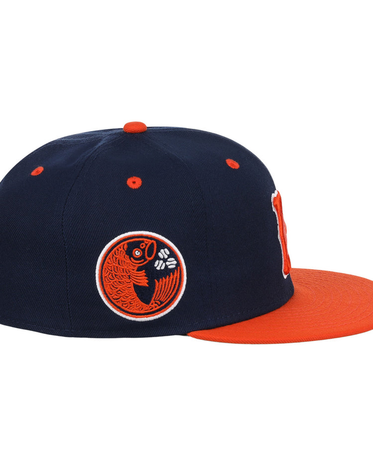The Hiroshima Carp EFF DNA Fitted Ballcap by EFF features a navy vintage design with an orange brim and an embroidered orange and black fish logo, inspired by the iconic Hiroshima Carp style.