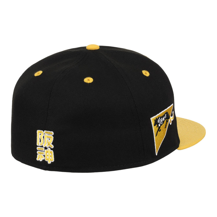 The Osaka Tigers EFF DNA Fitted Ballcap by EFF features a black and yellow vintage design, embroidered Japanese characters, a yellow bill, and Tigers with a tiger graphic—ideal for Japanese baseball fans and Ebbets Field Flannels lovers.