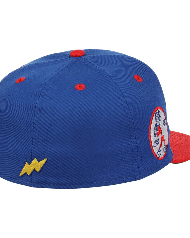 The Reddy Kilowatt EFF DNA Fitted Ballcap by EFF is a blue vintage cap with a red brim and button, featuring a yellow lightning bolt on the side and a round Reddy Kilowatt patch on the back.