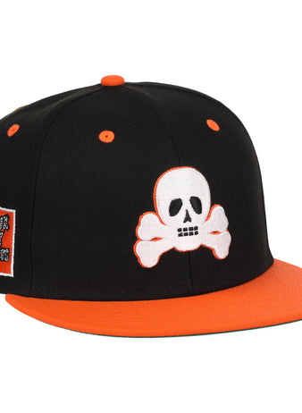 The Sioux City Ghosts EFF DNA Fitted Ballcap by EFF is a vintage-inspired black cap with orange accents, a white skull and crossbones on the front, and a side patch honoring the Sioux City Ghosts.