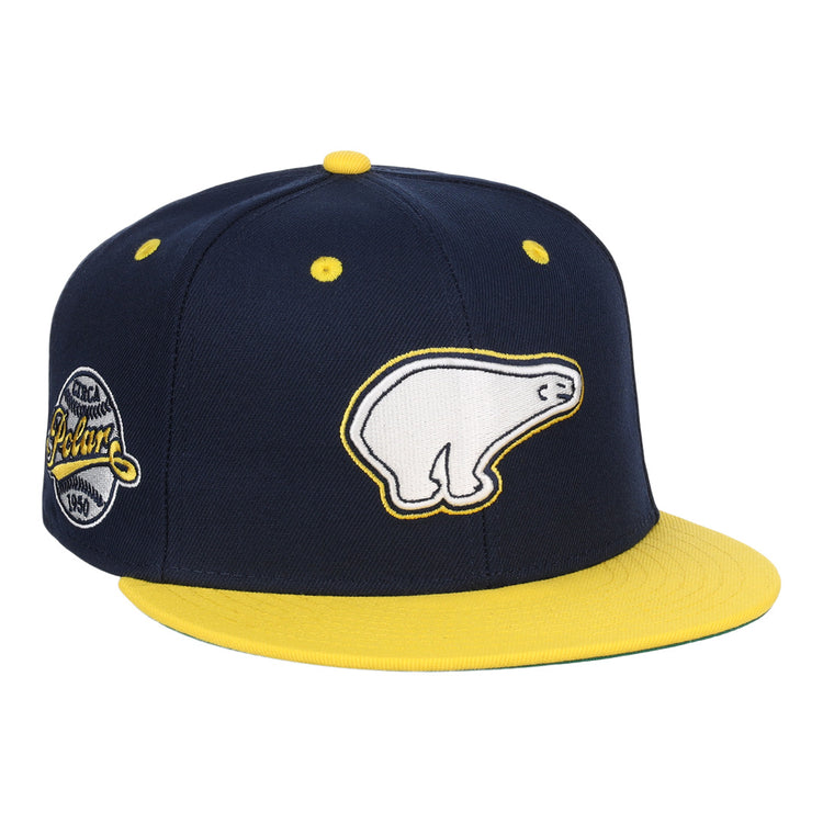 The EFF Cerveceria Polar EFF DNA Fitted Ballcap is a navy blue and yellow vintage-style cap with a white polar bear logo on the front, a Cuban Amateur League patch on the side, and a bright yellow bill and button.