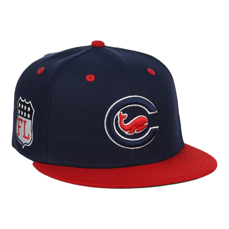 The EFF Chicago Whales EFF DNA Fitted Ballcap is a vintage-inspired navy cap with a red brim, stylized “C” and Whales logo on the front, plus an “FL” shield patch on the side.