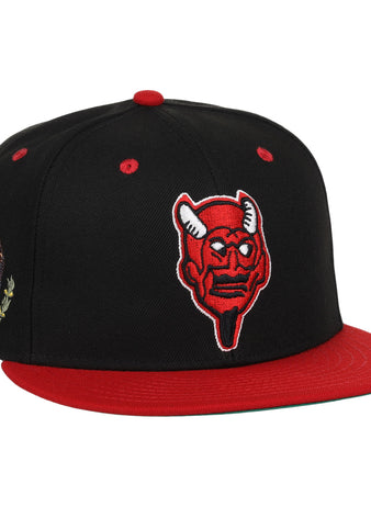 The EFF Mexico Diablos EFF DNA Fitted Ballcap is a black and red hat featuring a red horned devil patch, an embroidered Mexican eagle on the side, and vintage-inspired details in classic Mexican League style.