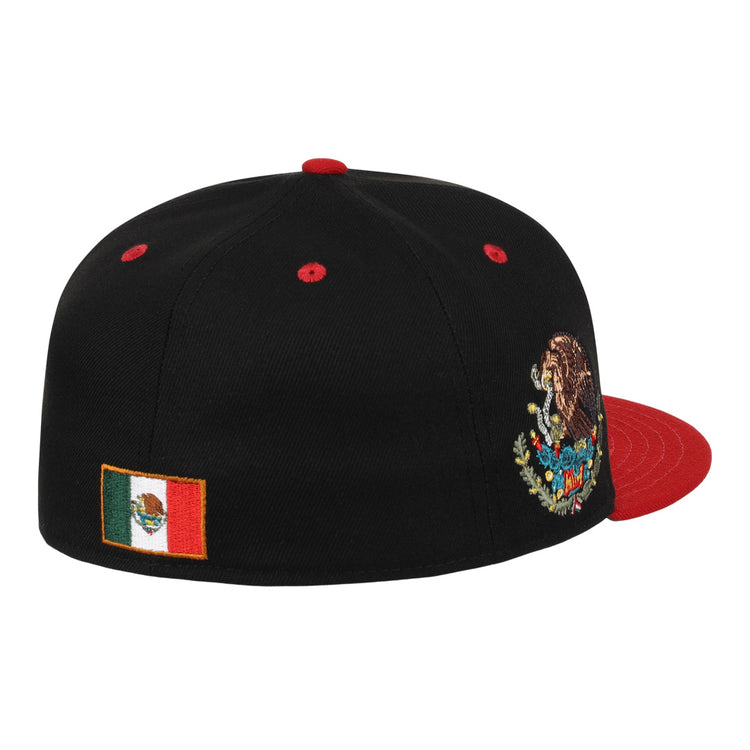 The Mexico Diablos EFF DNA Fitted Ballcap by EFF features a black crown, red brim, the Mexican national emblem embroidered on the front, and the Mexican flag on the side—a vintage-inspired tribute to Mexican League style.