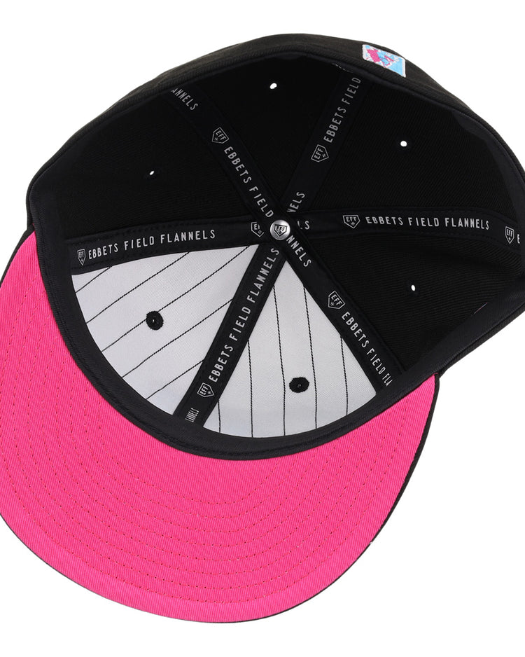 Inside view of the Miami Giants NLB Team Color Fitted Ballcap by EFF: black crown, bright pink brim, gray pinstripe panel, EFF logo taping, and a colorful patch on the inner back.