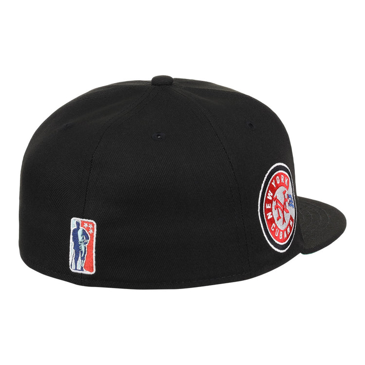 The EFF New York Cubans NLB Team Color Fitted Ballcap is a black cap with a 3D NY logo, honoring the Negro National League with side embroidery and a back patch of a bat-wielding figure.