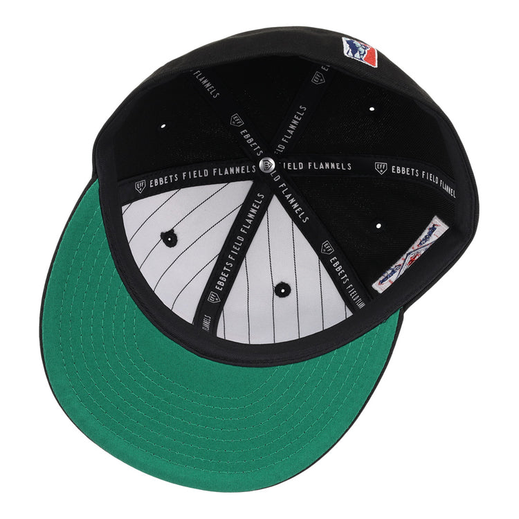 An inside view of the EFF Philadelphia Stars NLB Team Color Fitted Ballcap shows its black design, green undervisor, white pinstripe lining, Ebbets Field Flannels labels on the inner bands, and an embroidered Star logo.