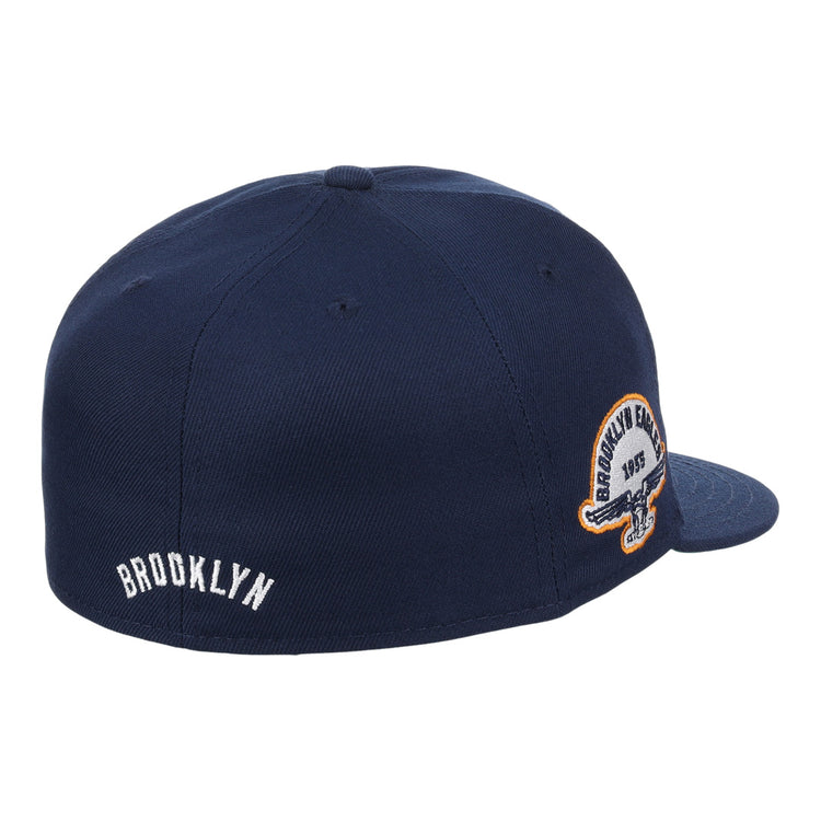 The EFF Brooklyn Eagles NLB Team Color Fitted Ballcap features a navy blue design, white BROOKLYN embroidery on the back, a circular Brooklyn Eagles patch on the side, and classic vintage-inspired details.