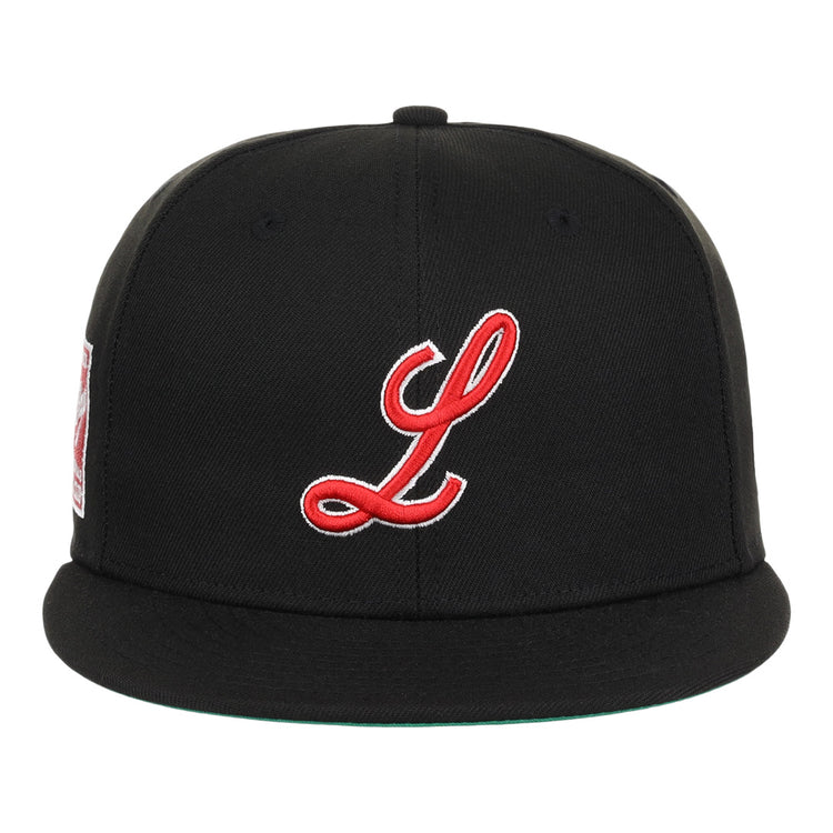 The EFF Louisville Black Caps NLB Team Color Fitted Ballcap features a black base, flat brim, red and white embroidered L on the front, and side patch honoring Negro National League heritage.
