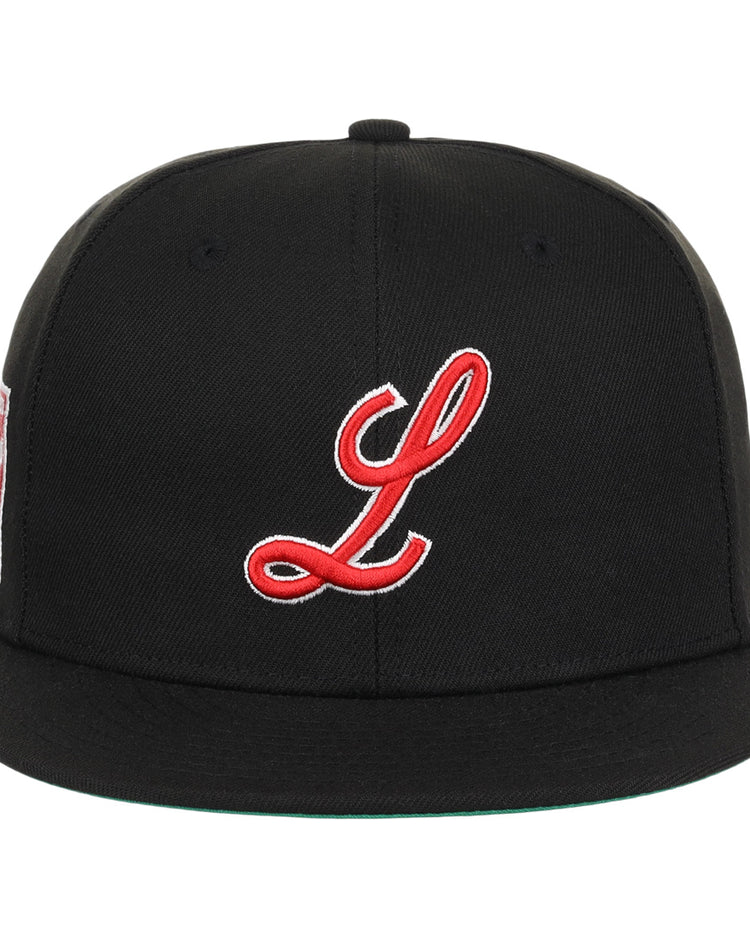 The EFF Louisville Black Caps NLB Team Color Fitted Ballcap features a black base, flat brim, red and white embroidered L on the front, and side patch honoring Negro National League heritage.