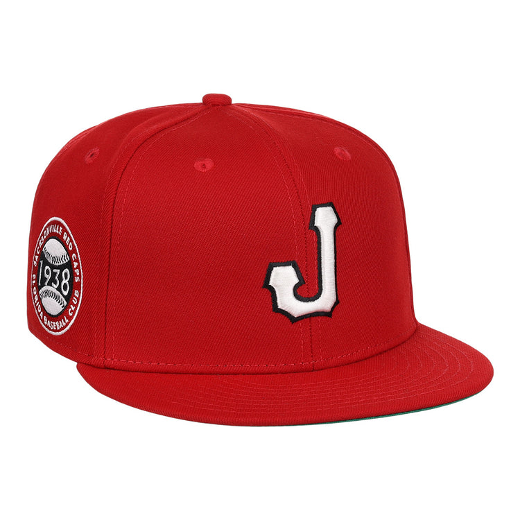 The EFF Jax Red Caps NLB Team Color Fitted Ballcap features a red design with a white and black 3D embroidered J on the front and a side patch reading Baseball Club 1938, honoring Negro American League history.