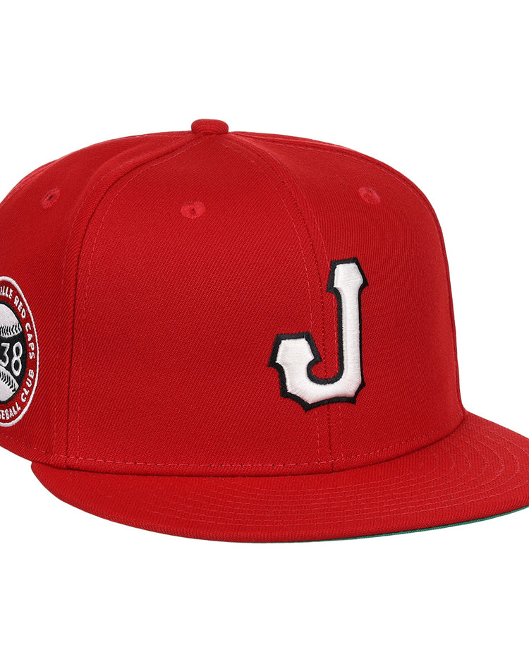 The EFF Jax Red Caps NLB Team Color Fitted Ballcap features a red design with a white and black 3D embroidered J on the front and a side patch reading Baseball Club 1938, honoring Negro American League history.
