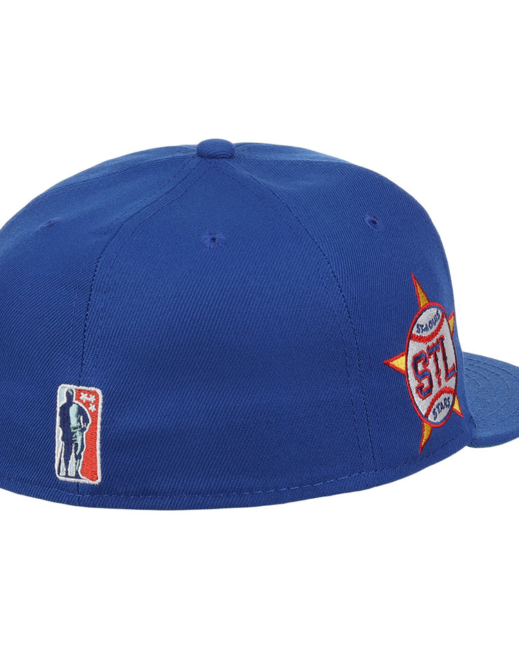 The EFF St. Louis Stars NLB Team Color Fitted Ballcap features a royal blue design with a red, white, and orange side logo and a small player logo on the back, honoring the Negro National League in vintage style.