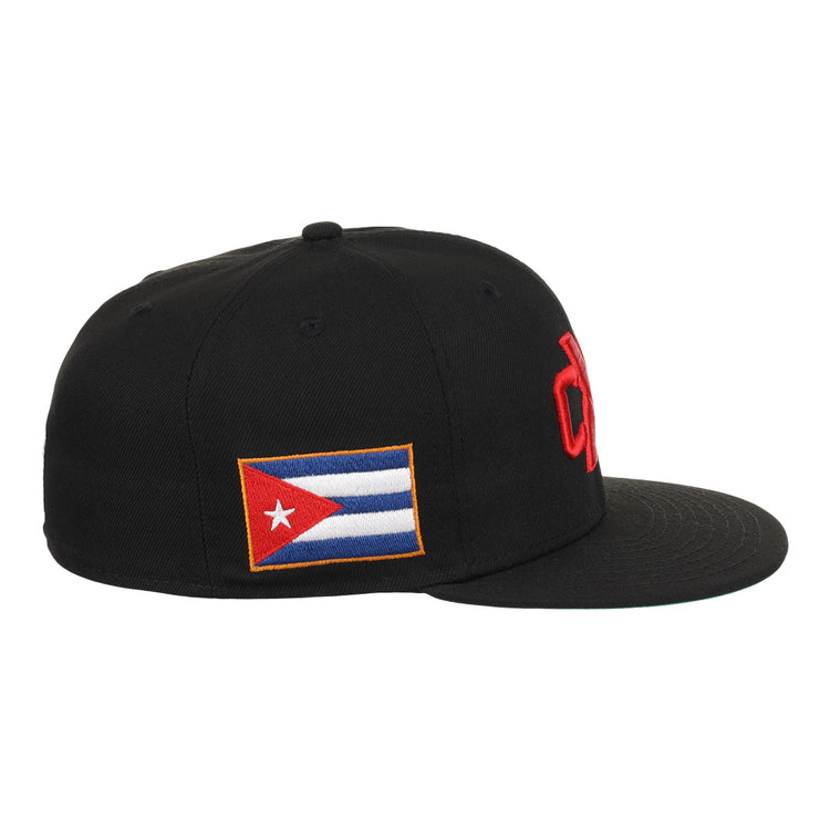 The EFF Cuban X Giants NLB Team Color Fitted Ballcap is black, features a bold red 3D embroidered front logo and a Cuban flag patch on the side, shown here in a side view.