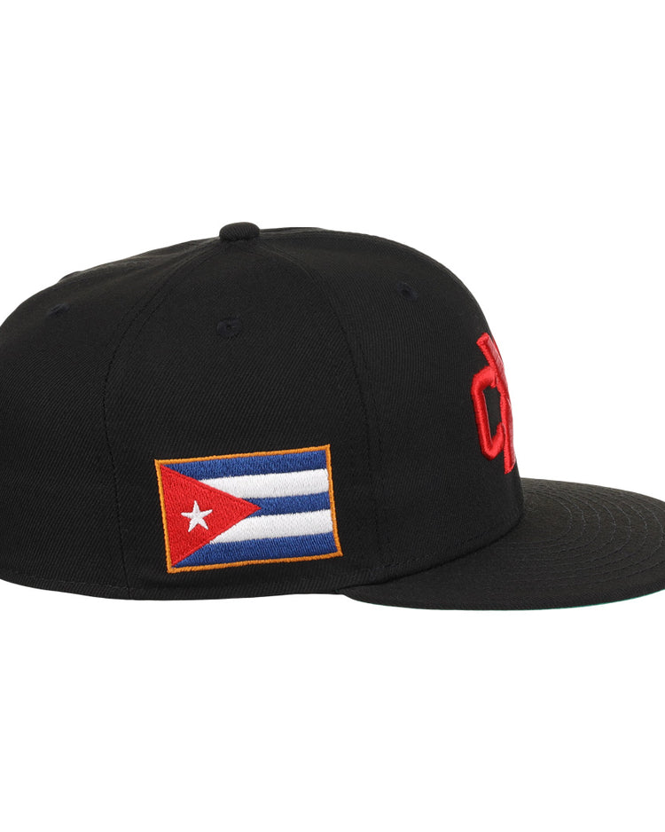 The EFF Cuban X Giants NLB Team Color Fitted Ballcap is black, features a bold red 3D embroidered front logo and a Cuban flag patch on the side, shown here in a side view.