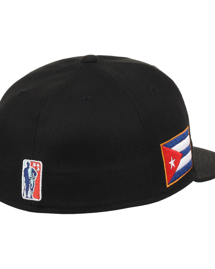 The EFF Cuban X Giants NLB Team Color Fitted Ballcap is a black hat with a Cuban flag patch on the side and a small 3D embroidered baseball player logo near the back.