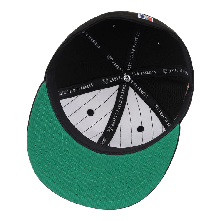 Top view of the EFF Cuban X Giants NLB Team Color Fitted Ballcap reveals green underbill, white pinstripe fabric, black panels, and EFF branding—classic details for this vintage-inspired Negro league hat.