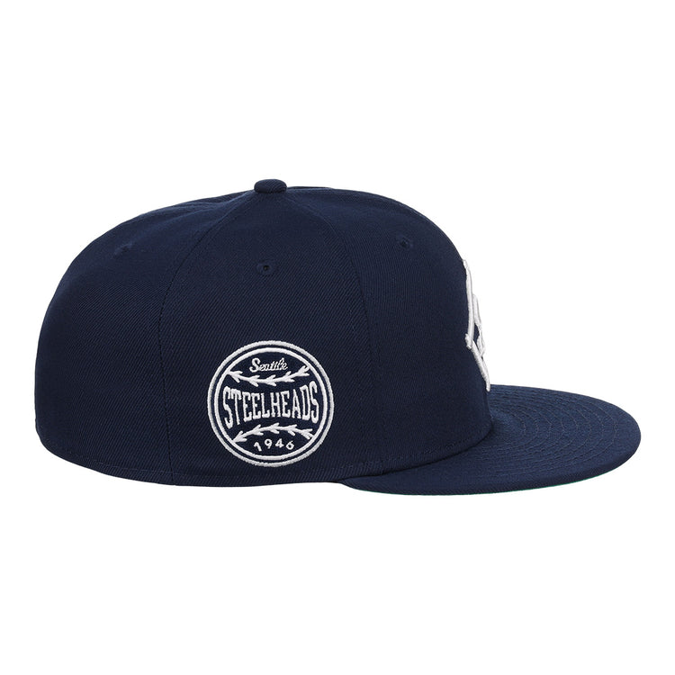 EFF Seattle Steelheads NLB Team Color Fitted Ballcap in navy features a flat brim and side patch with Seattle Steelheads 1946 in white—a vintage-inspired baseball hat for true fans.