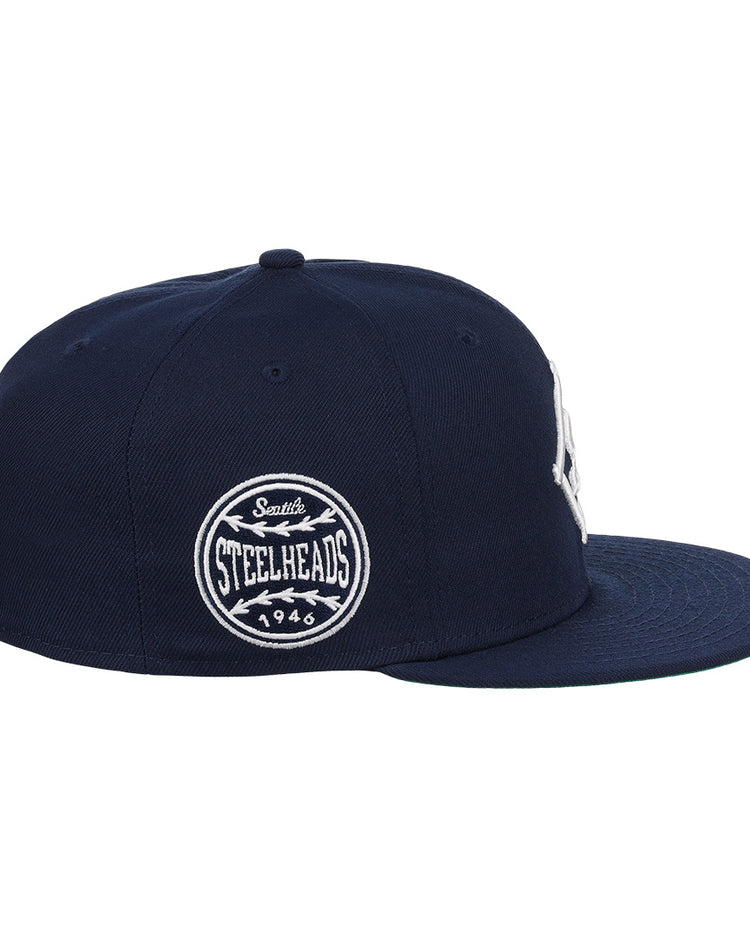 EFF Seattle Steelheads NLB Team Color Fitted Ballcap in navy features a flat brim and side patch with Seattle Steelheads 1946 in white—a vintage-inspired baseball hat for true fans.