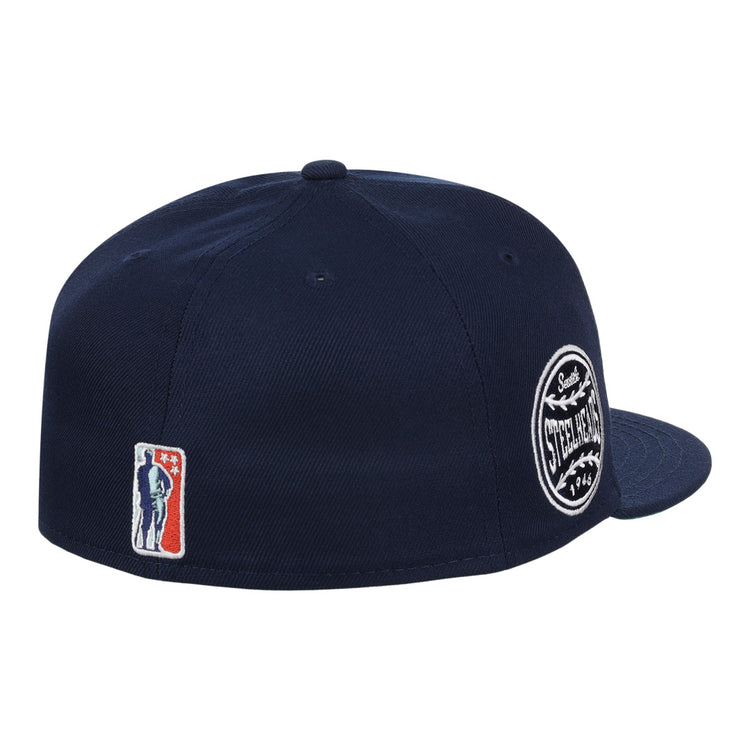The EFF Seattle Steelheads NLB Team Color Fitted Ballcap is a navy cap with a side circular team patch, embroidered logo with stars near the back, and vintage baseball-inspired detailing.