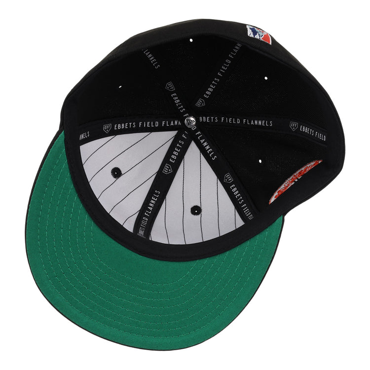The Baltimore Black Sox NLB Team Color Fitted Ballcap by EFF features a green underbrim, grey pinstriped lining, black sweatband with EFF label, and a small white, red, and blue logo—reflecting classic vintage style.
