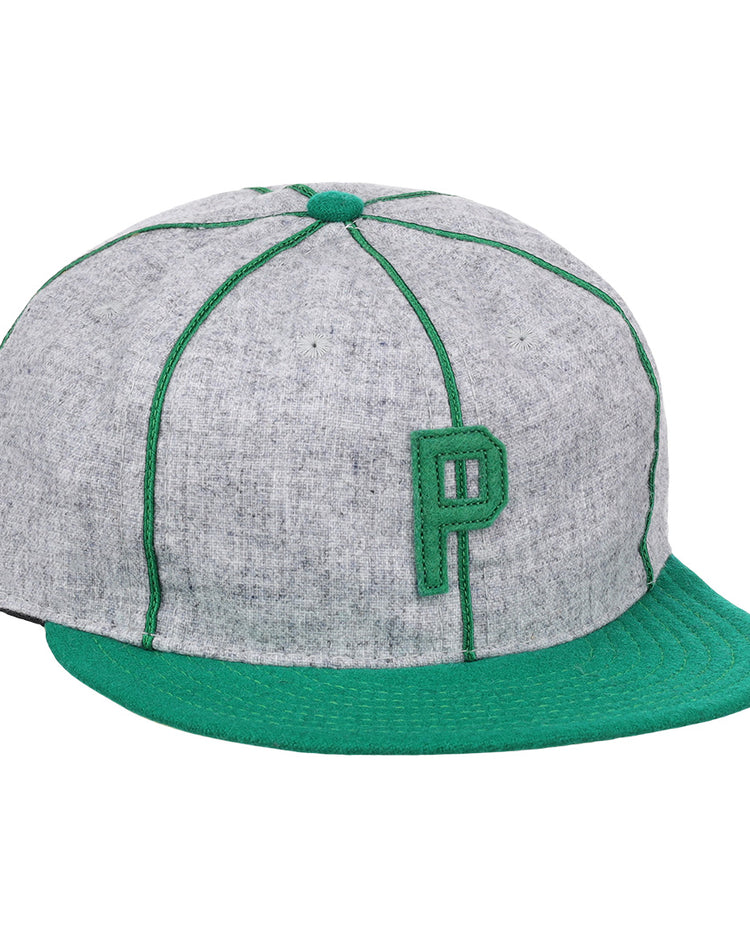 The Limited Edition Pittsburgh Filipinos 1913 Vintage Ballcap by Ebbets Field Flannels features gray fabric, green stitching and brim, and a bold green “P” embroidered on the front, celebrating an early Federal League legend.