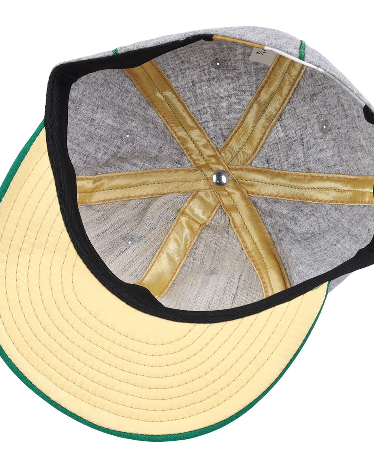 Top-down view of the Ebbets Field Flannels Limited Edition Pittsburgh Filipinos 1913 Vintage Ballcap, with a yellow brim, grey crown, gold inner seams, silver button, and green-trimmed edge—an authentic vintage-inspired piece.