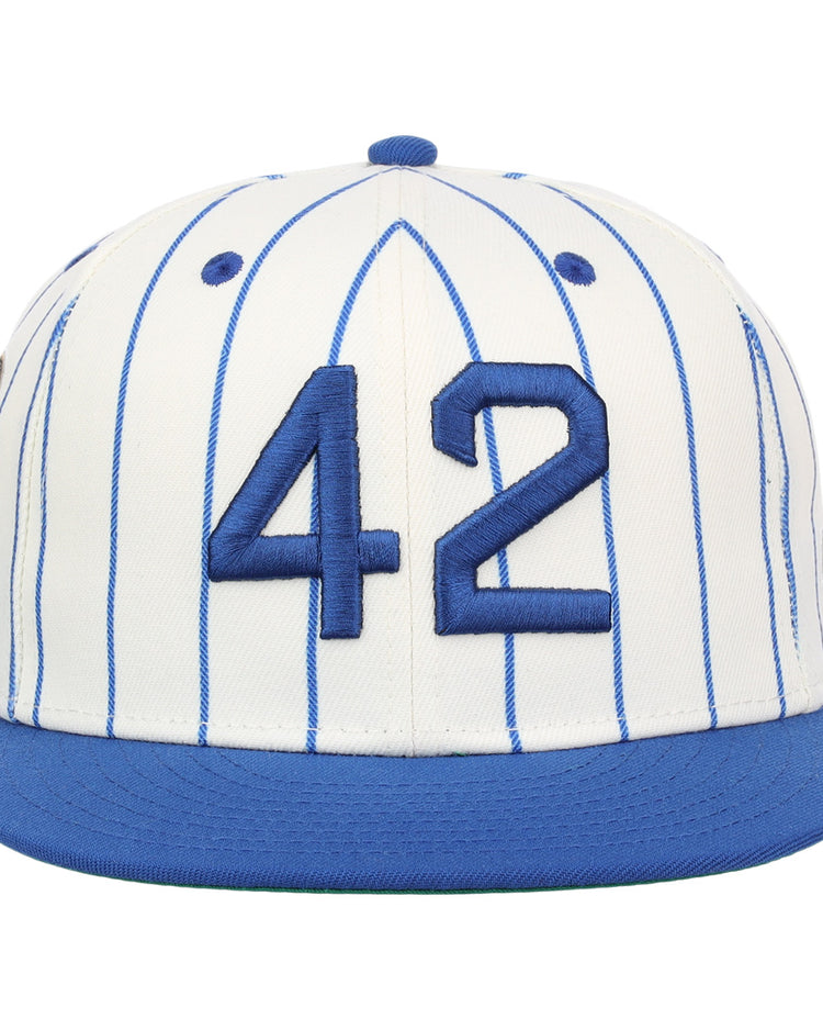 The EFF Jackie Robinson Signature Series Fitted Ballcap features blue vertical pinstripes, a blue bill, and 3D embroidered number 42 on white, honoring the iconic legend.