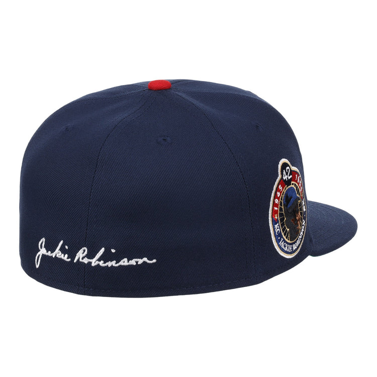 The EFF Kansas City Monarchs Robinson Fitted Ballcap in navy features a red top button, embroidered KC logo, 42 commemorative patch, and Jackie Robinson stitched in white script on the back.