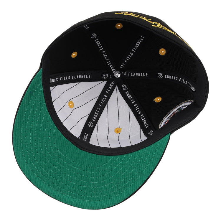 The Roberto Clemente EFF Signature Series Fitted Ballcap in black by EFF features a green under brim, white pinstripe lining, and yellow stitching, with “EBBETS FIELD FLANNELS” branding—classic style from above.