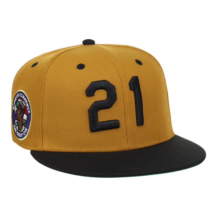The EFF Roberto Clemente Signature Series Fitted Ballcap in gold features black number 21 on the front, a colorful side patch, and a black brim—perfect for fans and collectors.