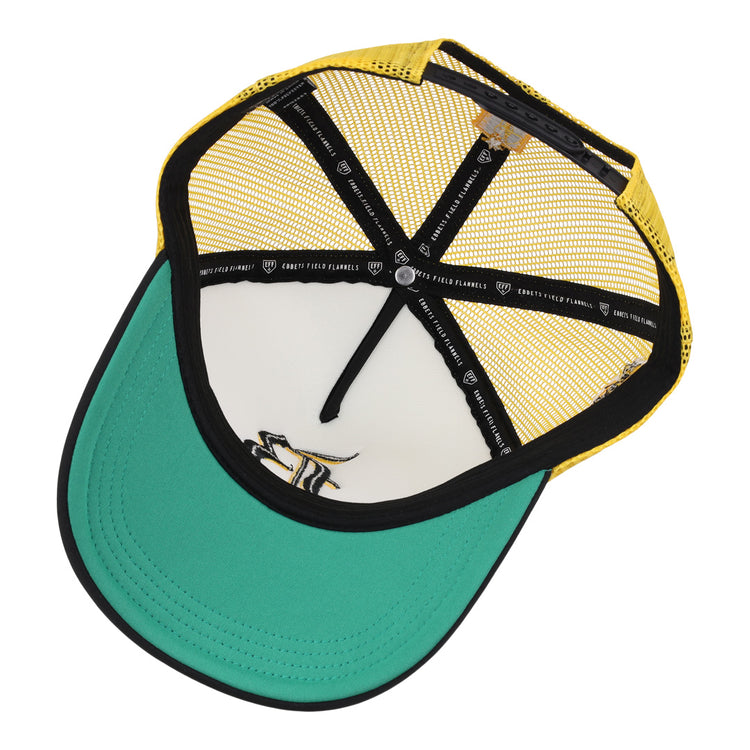 An overhead view of the EFF Beeville Blazers EFF Lone Star Foam Trucker hat shows its green brim, yellow mesh sides, white front panel, interior black taping and stitching, plus a stylized logo on the underside of the brim.