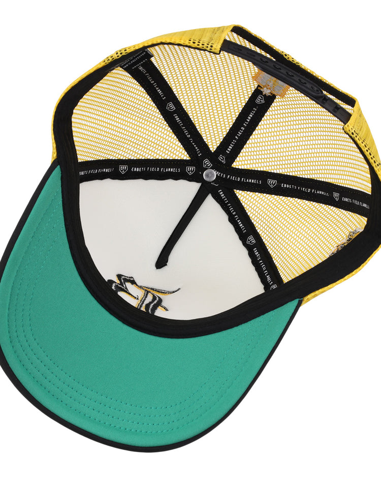 An overhead view of the EFF Beeville Blazers EFF Lone Star Foam Trucker hat shows its green brim, yellow mesh sides, white front panel, interior black taping and stitching, plus a stylized logo on the underside of the brim.